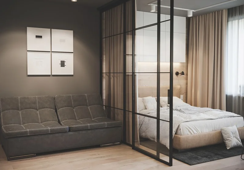 Дизайн спальни в квартире-студии с использованием раздвижной стенки
